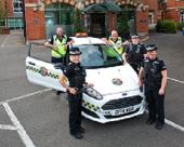 Uniformed Joint Enforcement Team officers with liveried vehicle