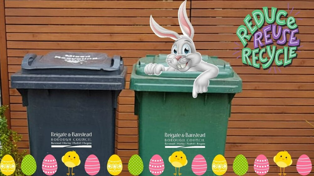 Easter bunny in a household waste bin