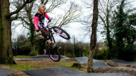Photograph of biker on the pump track