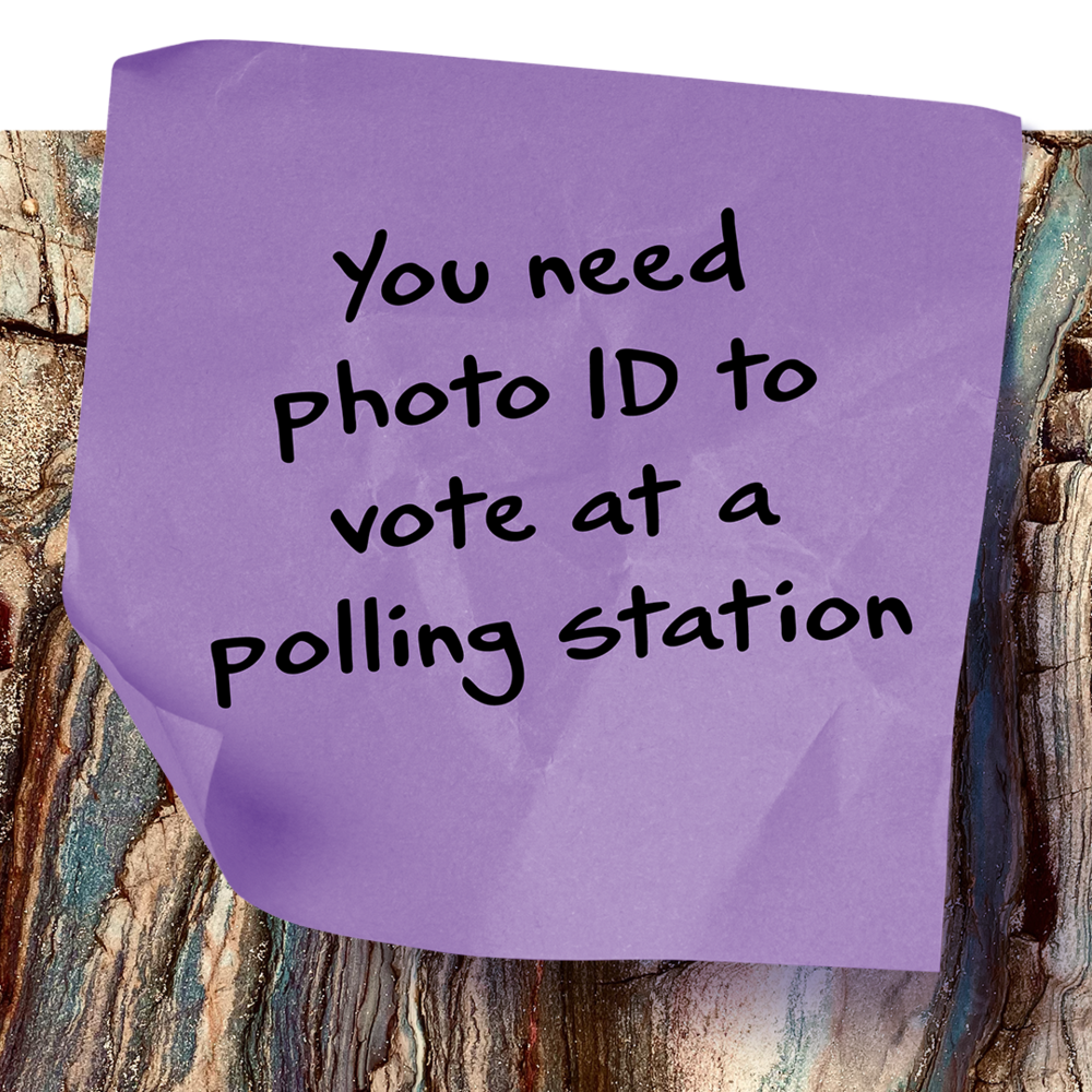 Post-it note with text: You need voter id to vote at a polling station