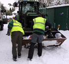 Staff clearing snow 