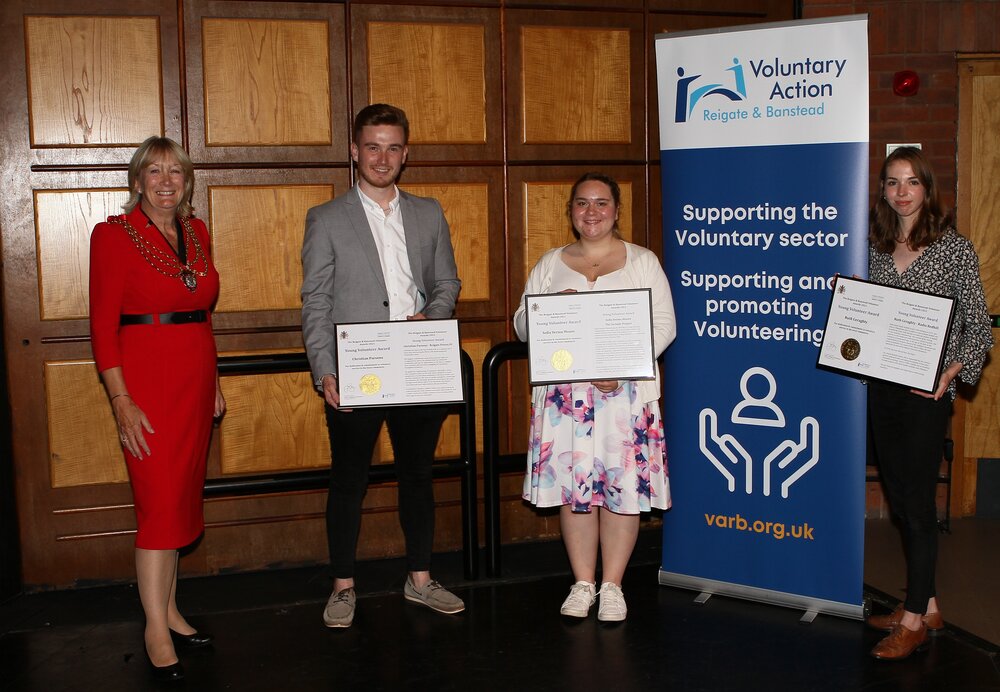 The Mayor of Reigate & Banstead, Councillor Jill Bray, presents awards to winners in the Young Volunteer category