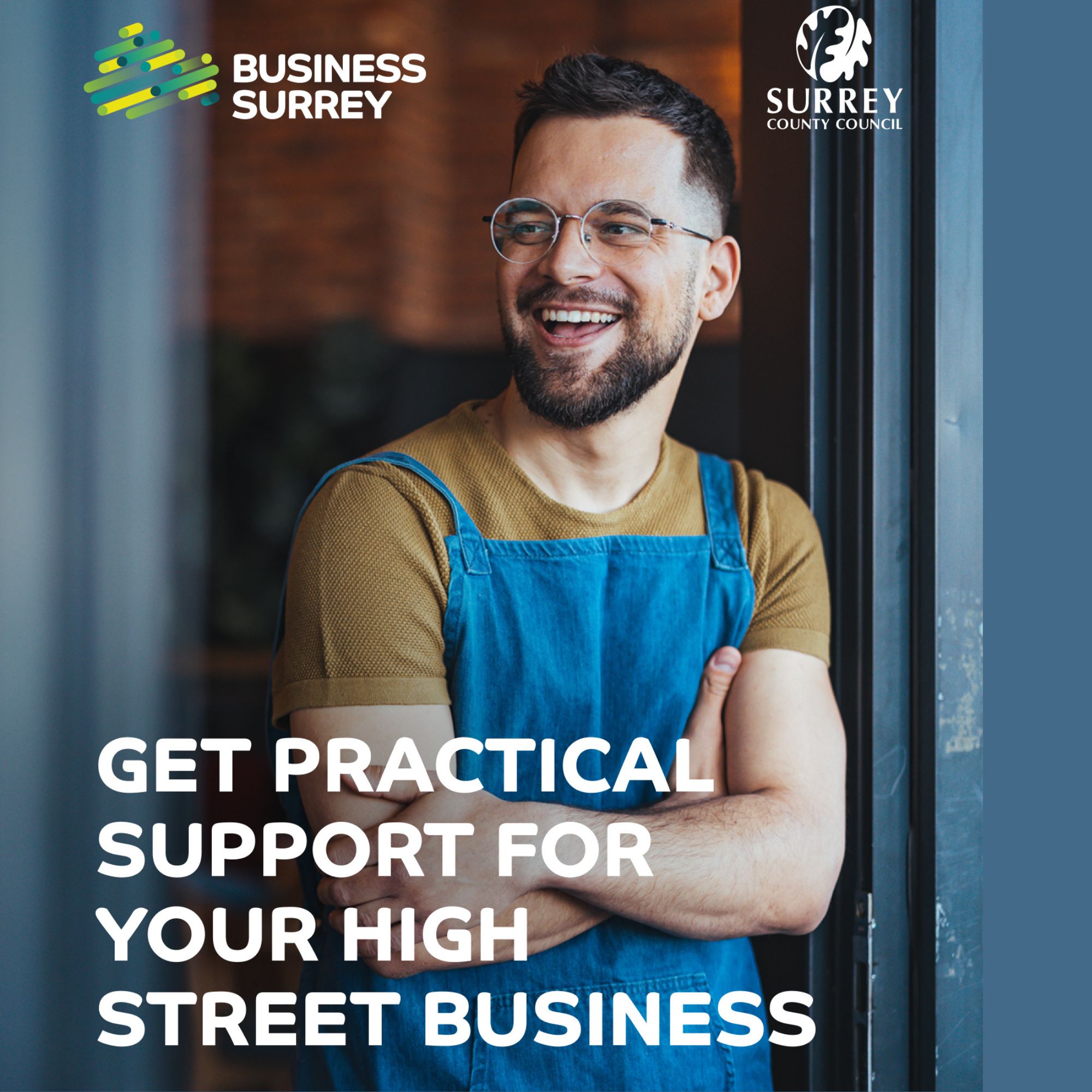 Promotional graphic showing a person standing with folded arms in the doorway of a business, wearing a brown shirt and blue apron. The image includes the Business Surrey and Surrey County Council logos, along with the text ‘Get practical support for your high street business.