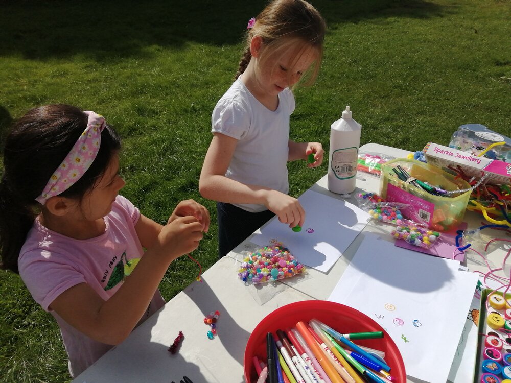 Young people enjoying outdoor crafts