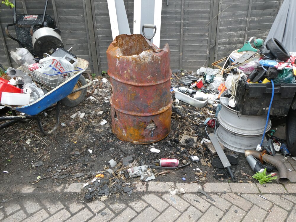 A local landlord has been fined for burning plastics and other waste