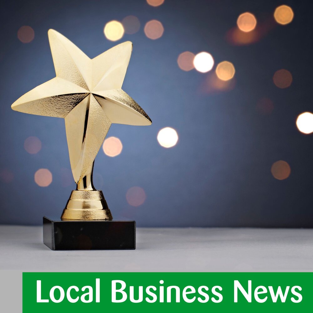 picture of gold trophy cup on black stand