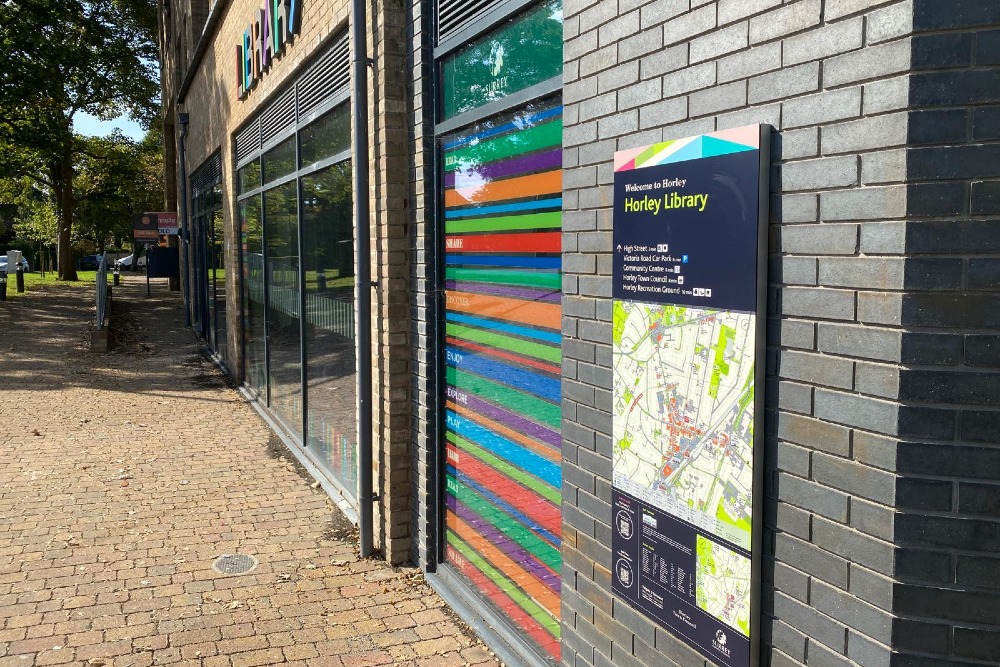 Map-based way-finding sign outside Horley library