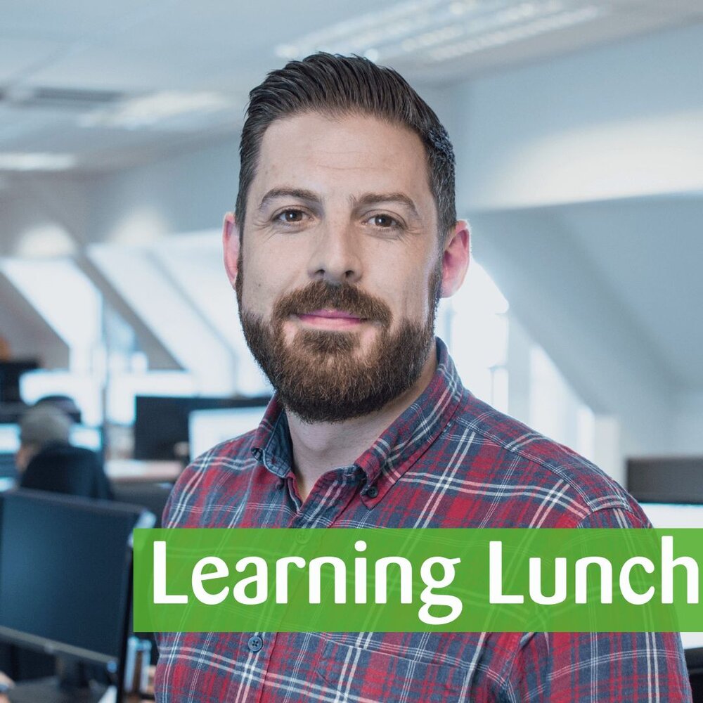 Photo of France du Buisson, FDB Associates, wearing a green and blue striped jumper