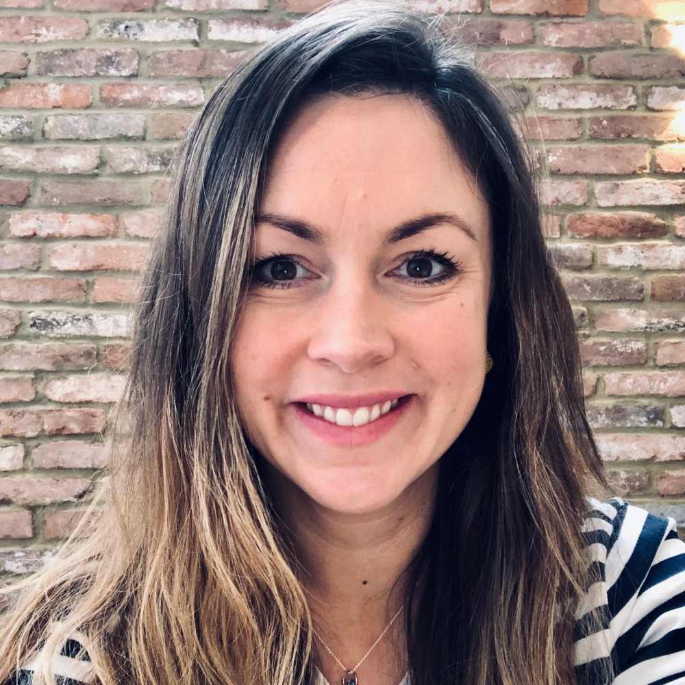 Photos of lady with long dark hair and striped top