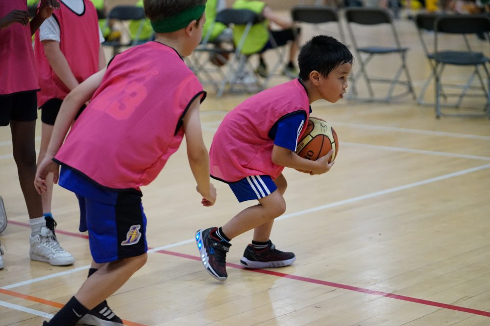 children playing basketball