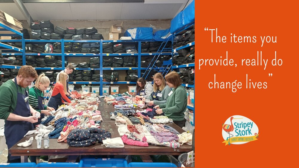 Stripey Stork volunteers sorting donations