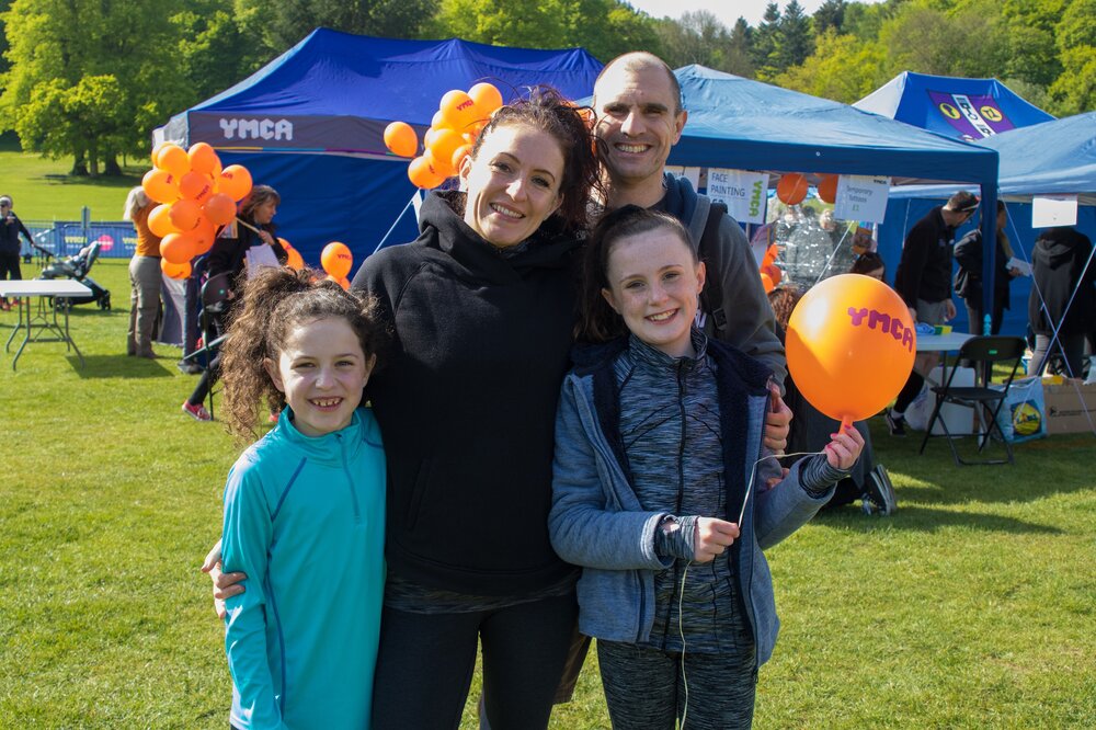 A picture of a family at the Fun Run and Sports Festival in 2022