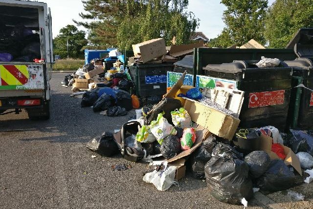 Removing fly tipping at Tattenham Corner