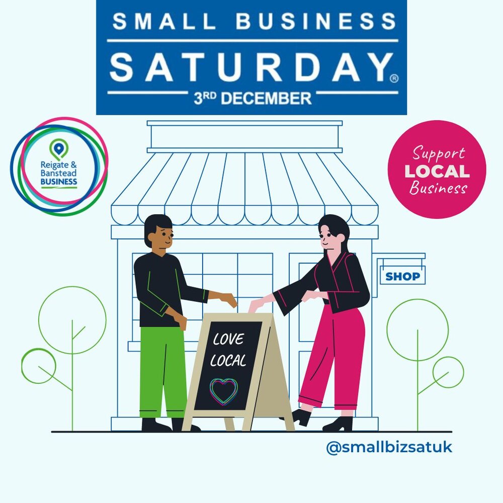 graphic of two shop keepers with a board for small business saturday