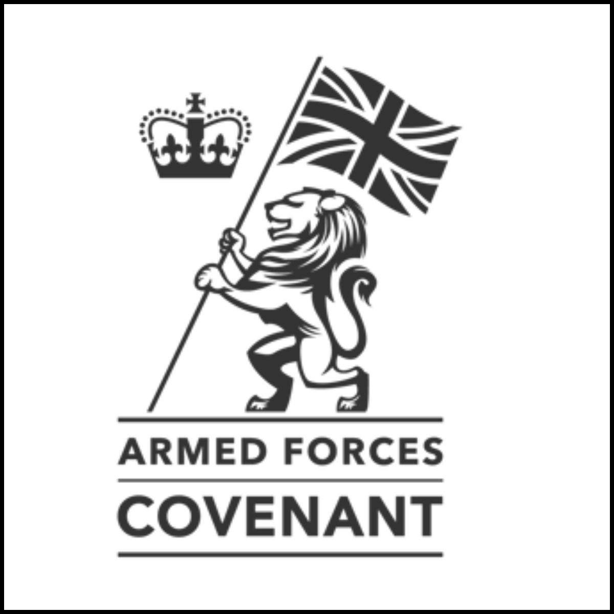 Black‑and‑white Armed Forces Covenant logo featuring a lion holding a Union Flag on a pole, with a crown above and the words ‘Armed Forces Covenant’ beneath