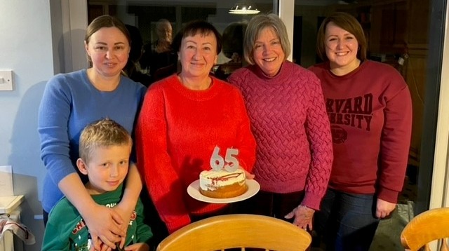 A picture of local resident Jill with the Ukrainian family of four that she is hosting